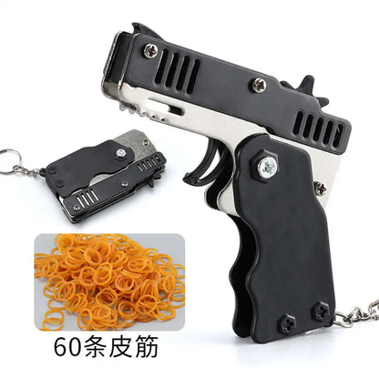 1PCS Mini Keychain Gun Rubber Band Gun Toy Shooting Pistol Alloy Kid Outdoor Party Folding Metal Gun Gifts Boyfriend Toys gift